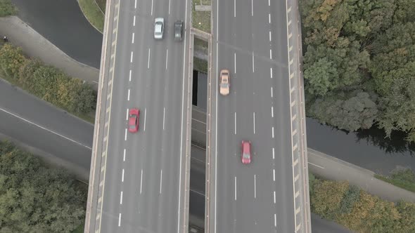 Aerial Top View Of Vehicles Driving At M50 Motorway In Dublin City, Ireland. tilt-up alt