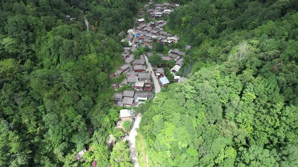 Aerial view of Mae kampong village,  Houses in valley, Chiang Mai, Thailand by drone