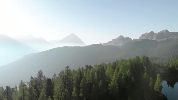 Aerial Flying over Mountain Forest at Croda da Lago in Dolomites Alps Italy alt
