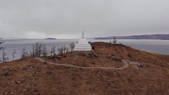 Panorama of the Island of Ogoy in Cloudy Weather. Buddhist Stupa on Lake Baikal