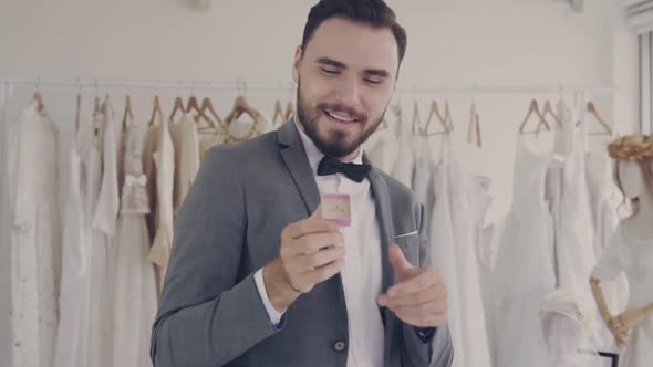 Funny Groom Man Wearing Wedding Clothes Dance in Dressing Room alt