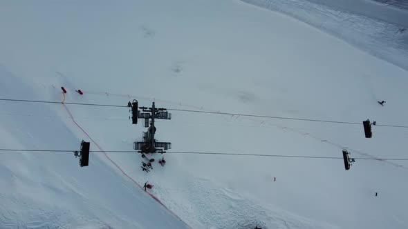 Aerial View of the Alps Mountains in France. Mountain Tops Covered in Snow. Alpine Ski Facilities