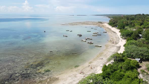 Boats in the Ocean Near the Coast of Zanzibar Tanzania Slow Motion alt