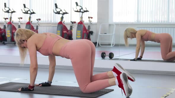 Young woman training in a sports club