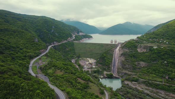 Majestic Aerial View of Green Mountains and Zhinvali Dam in Distance Caucasus Georgia alt