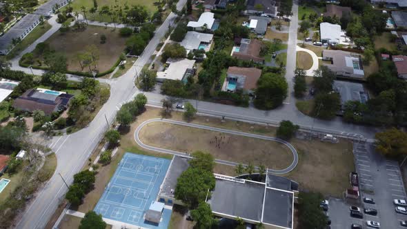 Aerial View of a South Florida Suburb with Many Pools alt