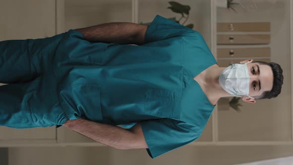 Vertical View Arab Hispanic Man Young Guy in Protective Medical Mask Doctor Nurse Surgeon in Uniform alt