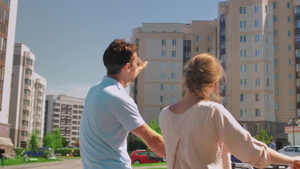 Happy Couple on a Bike Ride Communicates Smiles alt