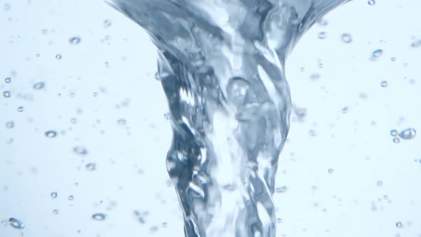 Water Vortex Spinning on Light Blue alt