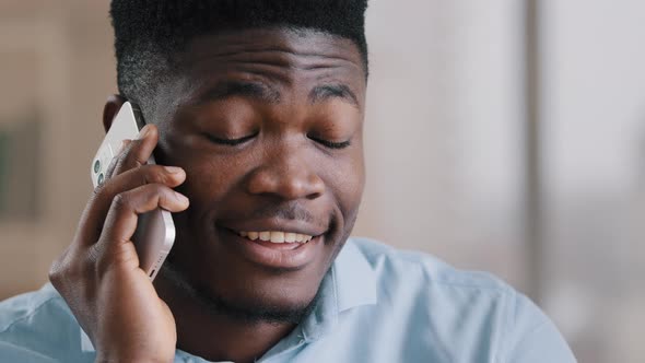 African American Happy Businessman Guy Talk on Cellphone Gadget Communicate Friendly with Partner alt