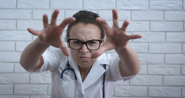 Angry doctor at clinic.  alt