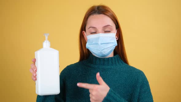 Young Red Hair Woman Posing Isolated on Yellow Color Background Studio alt