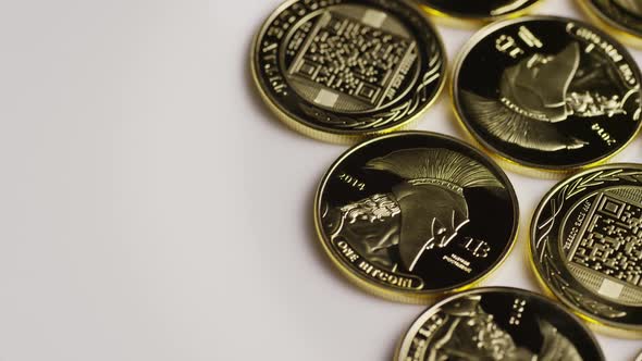 Rotating shot of Titan Bitcoins (digital cryptocurrency) - BITCOIN TITAN  alt