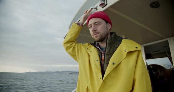 Portrait of a Smiling Sailor on a Boat in the Sea