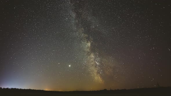 Night Starry Sky With Glowing Stars, Bright Glow Of Planets Saturn and Jupiter In Sky alt