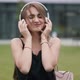 Girl Listening to Music with Headphones - VideoHive Item for Sale