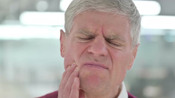 Close Up of Middle Aged Man with Toothache, Pain alt