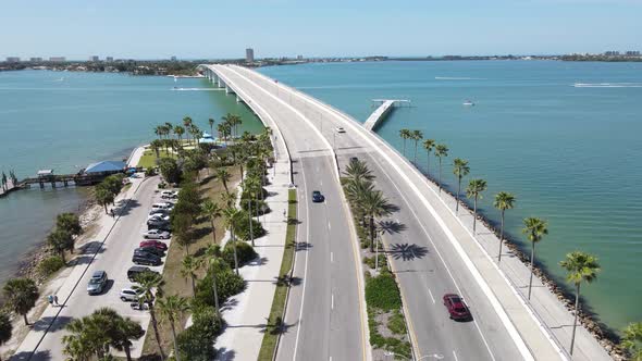 Beautiful ariel of the John Ringling Causeway in Sarasota, Florida.  Tourist love the palm line stre alt