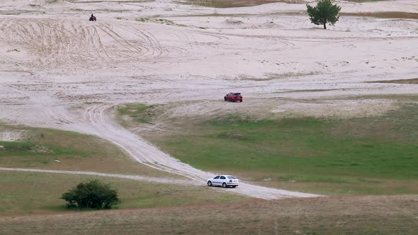 Driving cars in spring off-road fields