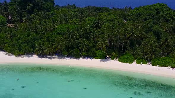 Summer scenery of coastline beach by sea with sand background near reef alt