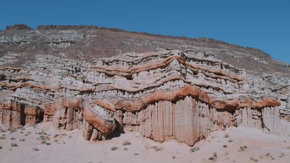 Red Rock Canyon in the California Mojave Desert on a summer day, Aerial Pan alt