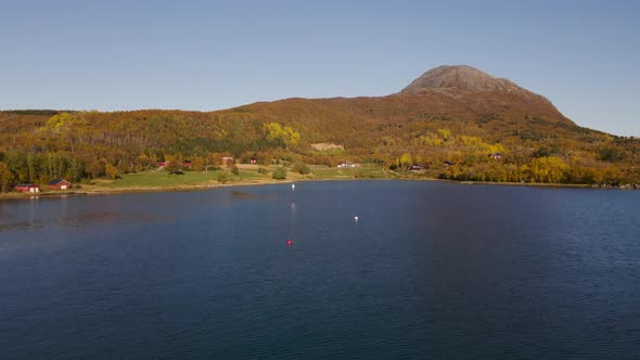 Boats Docked In Vagsfjorden In Troms og Finnmark, Norway Near Senja Island In Autumn. wide aerial alt