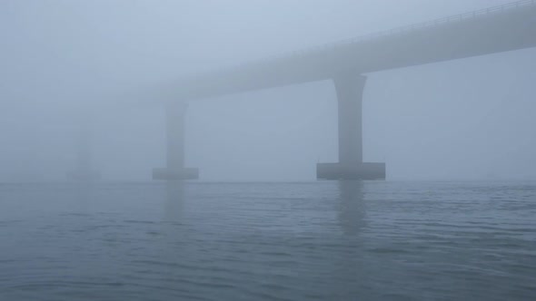 Sea and Bridge in Fog alt