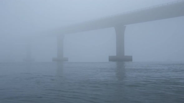 Sea and Bridge in Fog