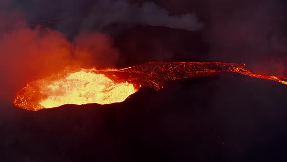 Closeup View of Hot Magmatic Material Splashing Above Crater alt