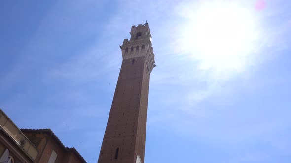 Tower of Mangia in the village of Siena, Tuscany, Italy, Europe. alt