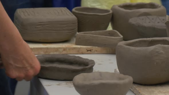 New Potter Engaged in Manufacturing Clay Pots