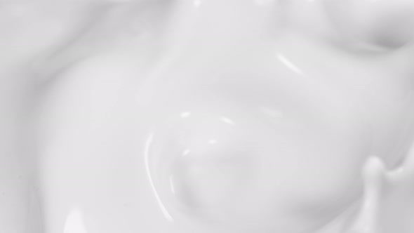 Super Slow Motion Shot of Splashing Cream at 1000Fps alt