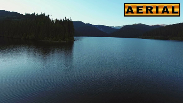 Fly Over Mountain Lake At Sunrise alt