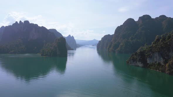 Aerial view landscape view Mountain in lake Refection sky with cloud on lake water. Khaosok Thailand alt