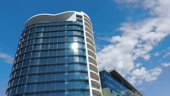 Office Building And Clouds