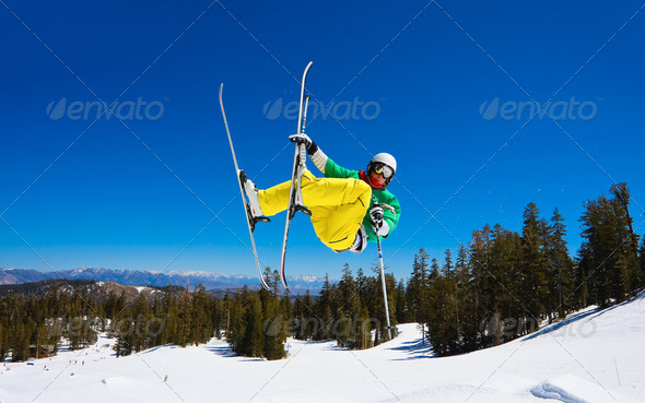Skier gets Big Air off Jump - Stock Photo - Images