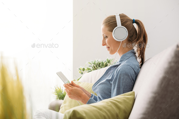 Woman using a tablet - Stock Photo - Images