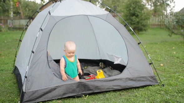 Beautiful Baby Is Playing With a Large Tent