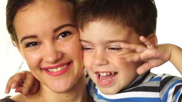 An Adult Brother And Sister Happy And Smiling On a White Background.