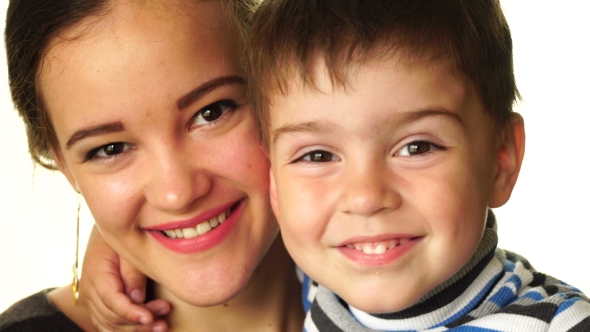 An Adult Brother And Sister Happy And Smiling On a White Background.