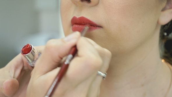 Makeup Artist Making Make-up For Stylish Model