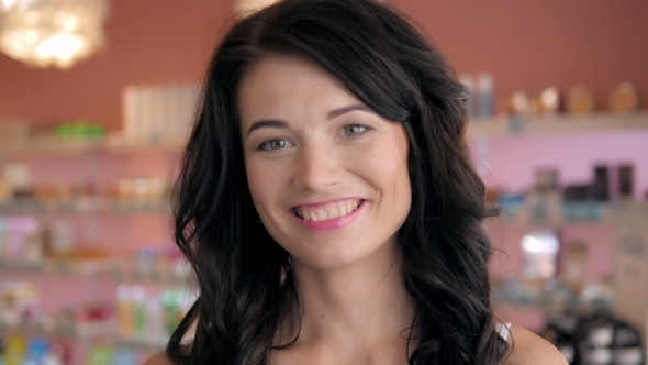 Portrait Of Beautiful Shopaholic Sexy Woman Inside a Store. alt