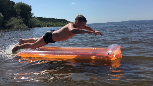 Boy Bathes In The River