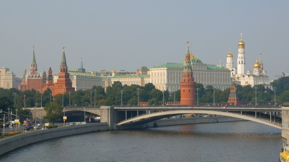 Bridge Over Moscow River, Walls And Towers Of Kremlin On Background, Summer Shot In Evening Time