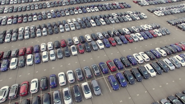Flying Above Storage Parking Lot Of New Unsold Cars, Aerial View