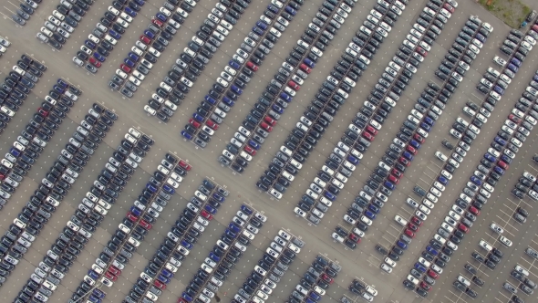 Flying Above Storage Parking Lot Of New Unsold Cars, Aerial View