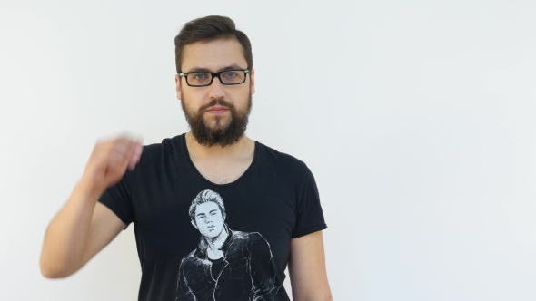 Handsome Man Taking Off Glasses With Right Hand And Laughing alt