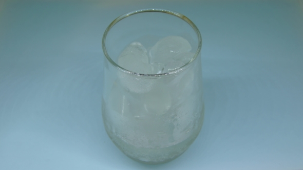 Ice Melting In Glass 