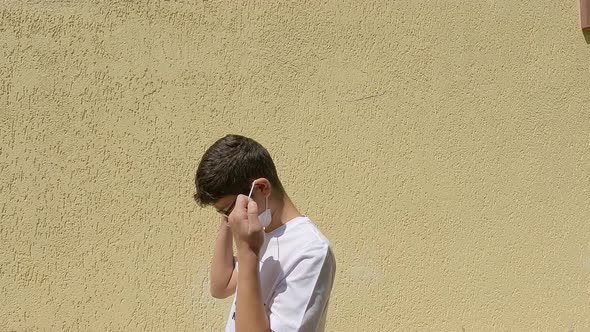 Boy wearing medical face mask