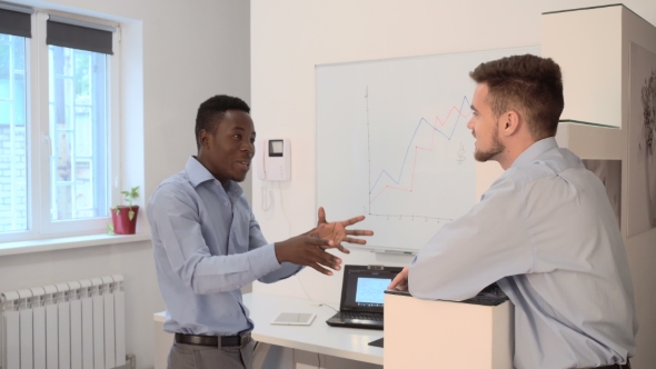 Businessman Talking In Office